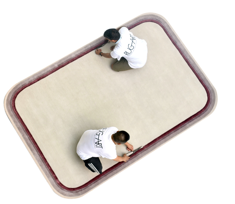 solid color rug with a border. plain essentials collection