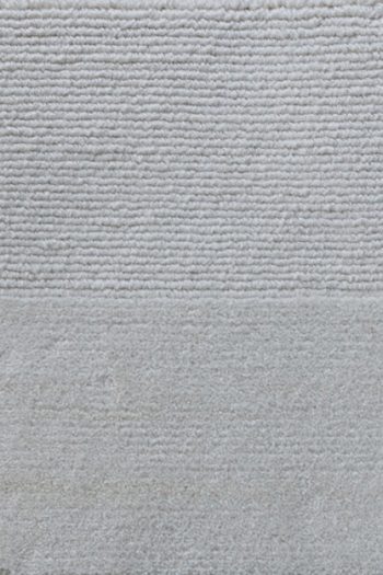 Performance solution dye acrylic yarn indoor/outdoor durable hand-made rugs.