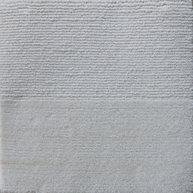 Performance solution dye acrylic yarn indoor/outdoor durable hand-made rugs.