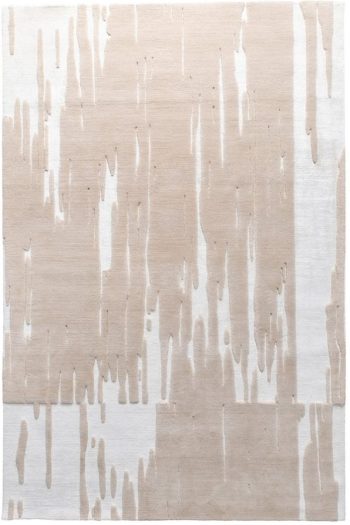 handmade neutral rug with abstract vertical texture and layered forms and ivory tones