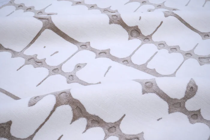 sonata hand carved rug showcasing rhythm and structure, available through rug art showrooms and national representatives.