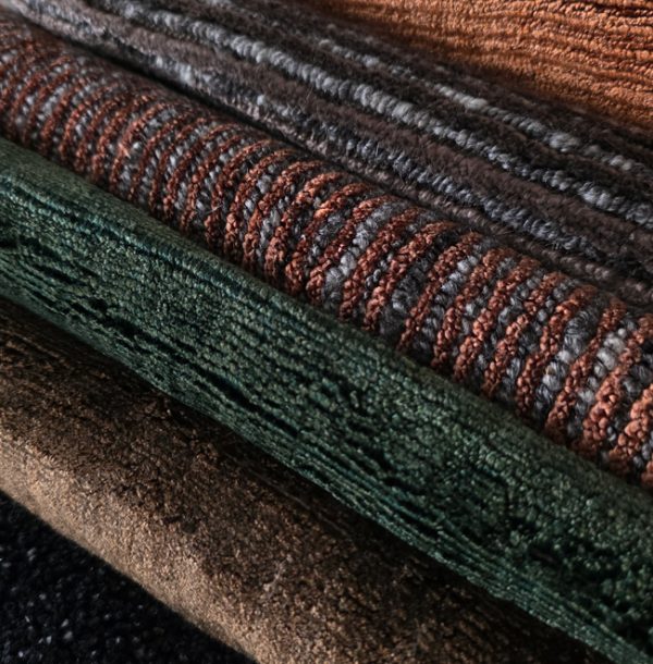 luxurious handmade rugs in brown, burgundy, green, rust, black colors. rug art nyc