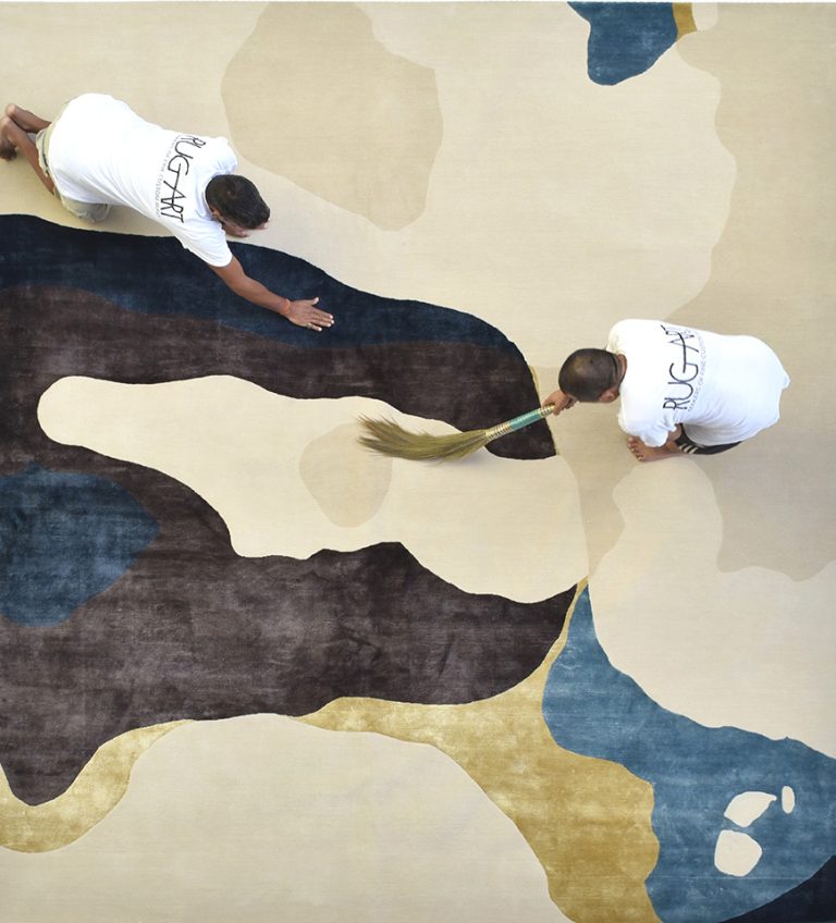 abstract design rug indi by rug art nyc. bold contrast luxurious rug.