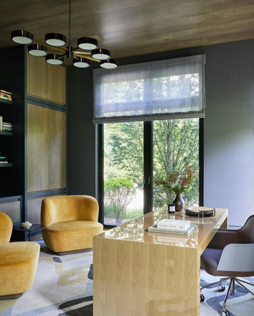 geometric abstract modern rug design for this gorgeous home office. cream, blue and gold rug.