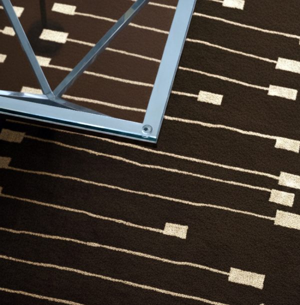 geometric design rug in brown and ivory. rug art